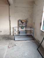 Plateforme élévatrice industrielle Risenmega 2-15m à entraînement électrique 400kg Convoyeur vertical monorail en acier profilé en H