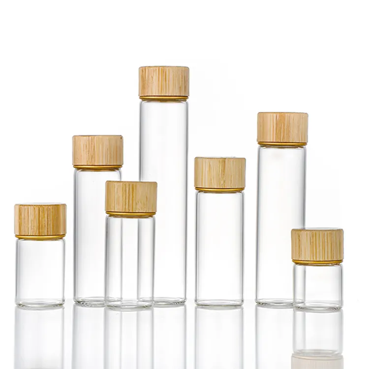 Frascos de muestra de vidrio para almacenamiento baratos al por mayor con tapa de bambú Botellas pequeñas de vidrio para aceite esencial
