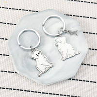 Porte-clés chat assis mignon en acier inoxydable, pendentif chaton blanc minimaliste, breloque arête de poisson en option, breloque chat de dessin animé pour sac, cadeau