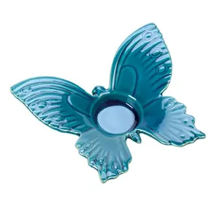 Portacandele a forma di farfalla smaltata blu portacandele in ceramica personalizzato economico