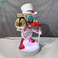 Sculpture de canard en résine de luxe avec sac d'argent, statue de canard de dessin animé, décoration moderne pour la maison, figurine d'art