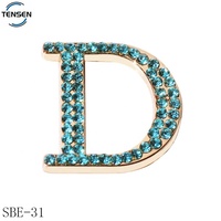 Accessoire de boucle en cristal avec logo floral métallique personnalisé, plaque nominative dorée pour sandales, décoration de chaussures de créateur