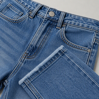 Jean taille haute à jambe large pour femme, en denim décontracté à ourlet brut, avec couture latérale, pour soirée romantique, vente en gros usine