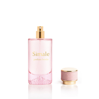 Bouteille en verre de parfum avec couvercle en cuir translucide rose 50ml 100ml et sac de boîte d'emballage logo personnalisé de luxe personnel
