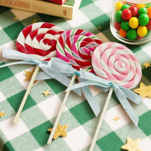 Vente en gros de sucettes arc-en-ciel spiralées scintillantes de Noël avec nœud pour décoration de fête des enfants - Product Image 2