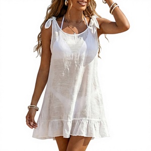 ชุดคลุมบิกินี่ผู้หญิงแบบมีระบายผูกโบว์  ผ้าถักเนื้อนุ่มสีพื้น ป้องกันรังสียูวี คอเสื้อแบบคอกลม แขนกุด ผลิตจากโพลีเอสเตอร์ 100% ความยาวปานกลาง เหมาะสำหรับใส่ไปชายหาด ขายส่ง - Product Image 1