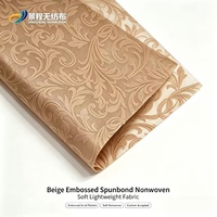 Tissu non tissé en spunbond à motif floral gaufré, matière texturée douce pour l'emballage et la décoration de cadeaux
