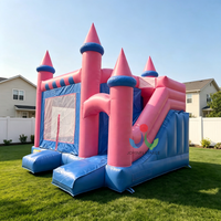 Château gonflable géant rose et bleu pour événements commerciaux, conforme à la norme EN14960, pour stimuler les revenus de location d'équipements événementiels en extérieur