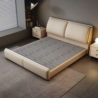 Lit de rangement king size moderne et luxueux avec revêtement en cuir véritable, design de lit moelleux pour petits appartements