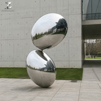 Sculpture en acier inoxydable poli miroir, motif galet, polie à la main, art abstrait pour la décoration extérieure des places publiques, jardins, entrées d'hôtels et aménagements paysagers