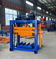 Machine à fabriquer des blocs de ciment manuelle TENGFEI QT4-40 pour briques de pavage pleines et creuses avec moteur 220V 380V