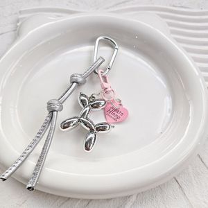 Goreal 2025 mới đến Phụ nữ túi chuỗi hợp thời trang Chic da bện bóng dễ thương bé nhỏ con chó Keychain túi quyến rũ - Product Image 6