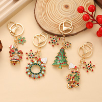 Nouvelle collection de Noël transfrontalière : Porte-clés et pendentif cloche en alliage de zinc, motif flocon de neige peint par goutte, style moderne et minimaliste