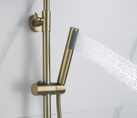 Nouvel ensemble de douche de pluie thermostatique ronde de salle de bain complète fixée au mur exposée en or brossé avec douchette