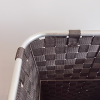 Panier à linge en nylon tissé noir avec roulettes pour les vêtements sales, poignée d'insertion solide pour un transport facile