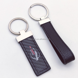 Llaveros Cuero de PU Personalizar Llavero de cuero genuino en blanco Regalos Marca de lujo Logotipo de coche Llavero de cuero de fibra de carbono Llavero - Product Image 4