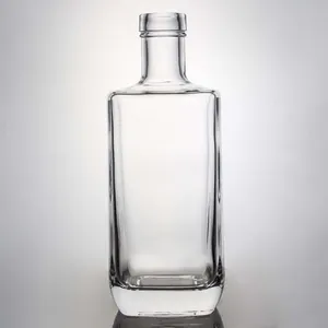 Botella de vidrio transparente de alta calidad de 700ml y 750ml, botella de licor de vidrio de cuello corto con hombro plano para whisky Tequila