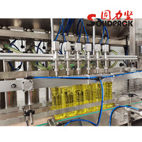 Machine de remplissage automatique d'huile de coco et de piment Solidpack |   Machine d'embouteillage d'huile comestible avec filtre