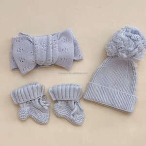 Set 2 Pezzi: Fascia per Capelli e Calzini per Neonata, in Cotone Lavorato a Maglia, con Fiocco Grande a Punto Traforato, Regalo per Neonato/a - Product Image 2