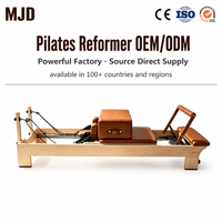 Lit de Pilates Reformer en Bois avec Barre Verticale Intégrée, Revêtement en Cuir, OEM ODM, Couleur et Logo Personnalisables, Équipement de Fitness pour Studio à Domicile