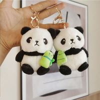 Vente en gros de jouets animaux en peluche panda mignon porte-clés en peluche doux jouets distributeur automatique de jouets mini porte-clés panda en peluche dessin animé Kawaii