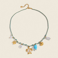 Collier en corde avec breloque coquillage et perle d'eau douce pour femme, en acier inoxydable plaqué or 18 carats PVD, style vacances océaniques, pour usage quotidien, été