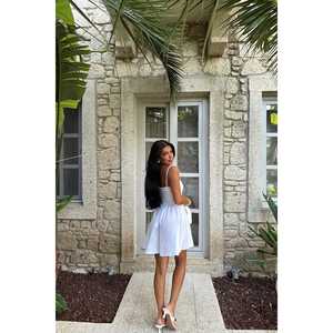 Robe mini blanche à fines bretelles de haute qualité, en spandex translucide, tailles XS-XL, style sexy décontracté pour soirée, avec doublure brodée pour le club ou les sorties de jour. - Product Image 1