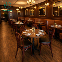 Ensemble commercial de mobilier de restaurant Ron Group : banquette en cuir à dossier haut, table ronde en bois massif et chaise rembourrée