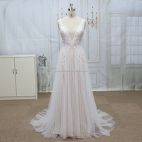 Robes de mariée élégantes en tulle français doux avec de belles fleurs en dentelle, photos réelles
