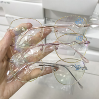Monture optique anti-lumière bleue sans monture pour femme, assortiment en stock, haute qualité, prix abordable, monture optique métallique sans monture 3 pièces