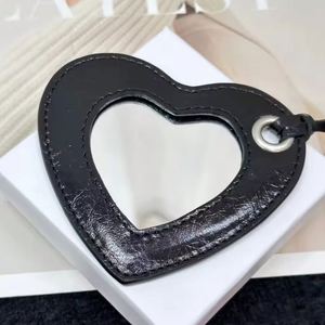 Miroir de maquillage compact en cuir PU en forme de cœur, breloque de sac, pendentif de poche, porte-clés, décoration de sac à main, cadeaux promotionnels - Product Image 4