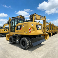 Excavatrice sur roues Caterpillar M318F d'occasion, godet de 0,91 m³, vitesse routière de 35 km/h, excellent état, directement de l'usine