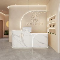 Comptoir d'accueil de luxe moderne pour hôtel, bureau d'information incurvé pour salon de beauté, comptoir éclairé par LED en bois d'ingénierie
