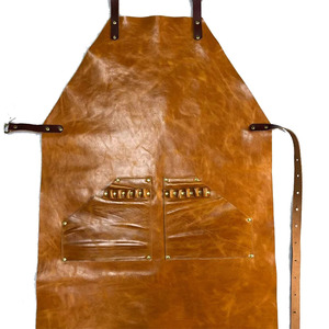 Delantal con un solo bolsillo frontal en el pecho, cintura ajustable, cuello con lazo y correa extraíble de liberación rápida. - Product Image 1
