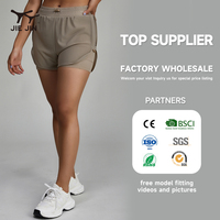 Vente en gros de shorts de gymnastique JIEJIN pour femmes 2 en 1 double pour la course à pied et le fitness avec compression