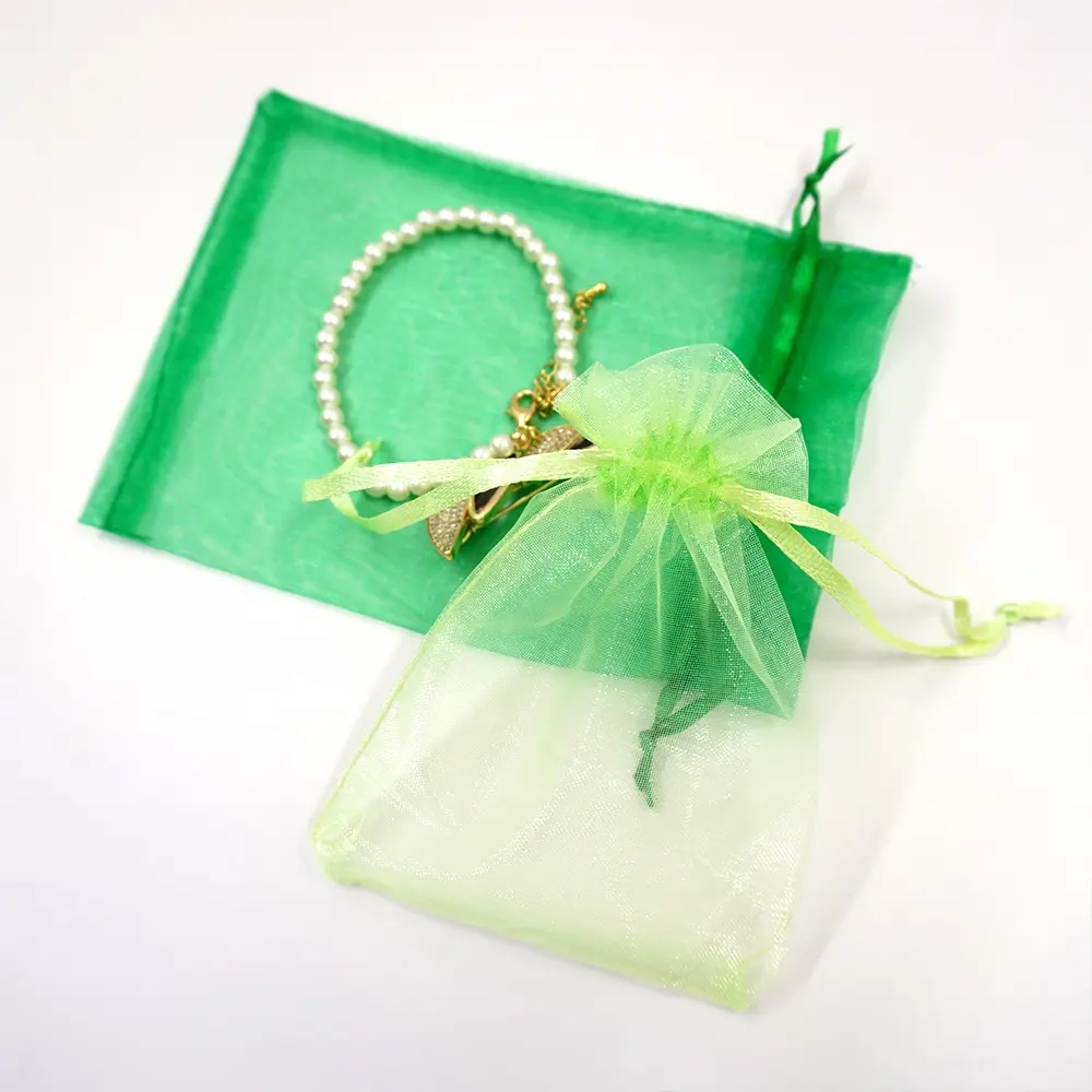 24 colores 7x9 Cm cosméticos caramelo cinta joyería embalaje bolsa Organza regalo bolsa cordón blanco Organza bolsas al por mayor