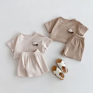 2024 नए बच्चों के पहनने वाले नवजात कपड़ों का सेट वफ़ल फैब्रिक छोटी आस्तीन वाला टॉप और छोटा बेबी हॉलिडे कॉटन सेट
