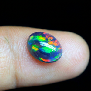 Opale noire éthiopienne de haute qualité, pierre précieuse brute, forme ovale 8x6mm, jeu de couleurs arc-en-ciel naturel, cabochon d'opale noire - Product Image 1