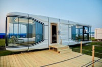 Maison préfabriquée en acier de conception moderne, portable, pour restaurant, avec balcon panoramique, pour camping, capsule spatiale
