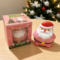 Jouet Squishy Père Noël multicolore festif et très populaire, emballé individuellement dans une boîte cadeau, idéal pour les cadeaux de Noël