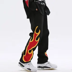 Sıcak satış Streetwear erkekler tasarımcı pantolon artı boyutu 3D alev nakış yama Baggy Joggers rahat düz kot