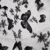Tissu de broderie en maille de robe brodée en dentelle de papillon blanc pour vêtements d'enfants