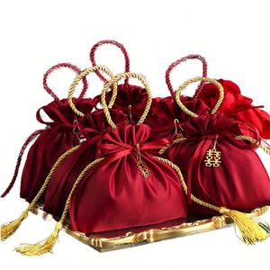 Nouvelle Arrivée : Pochette en Soie Rouge avec Cordon de Serrage, Sac Cadeau pour Bonbons et Bijoux avec Nœud, Idéal pour Anniversaire, Mariage, Emballage Textile - Product Image 1