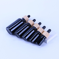 Botol Minyak Esensial Kaca Hitam dengan Tutup Bambu 5ml 10ml 15ml 20ml 30ml 50ml 100ml