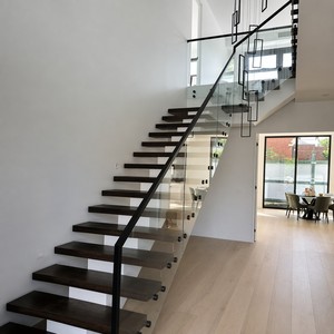 Escalera Flotante Moderna con Diseño en <span class=keywords><strong>Zigzag</strong></span> Central, Peldaños de Roble Macizo, Diseño de Escalones Abiertos, Personalizada para Villas, Lofts y Espacios Comerciales - Product Image 1