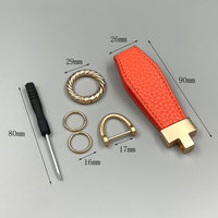 Nouveau porte-clés de voiture en métal en forme de T porte-clés en cuir Litchi alliage anti-perte pendentif lanière pour sac voiture vélo moto