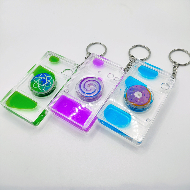 New Arrival Cute Liquid Oil Filled Keychain Wholesale Into the Oil Wholesale Decompression Floating Liquid Timer Keychain