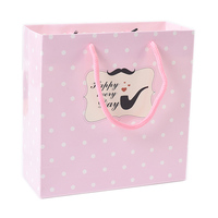 Sacs en papier personnalisés blancs imprimés sur mesure, prix le plus compétitif, avec logo et dimensions personnalisables, en coton enduit et corde.