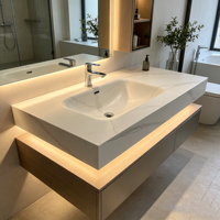 Évier de salle de bain monobloc moderne blanc sur mesure, en pierre frittée, avec bordure sans joint, fabriqué directement en usine, respectueux de l'environnement, idéal pour les hôtels