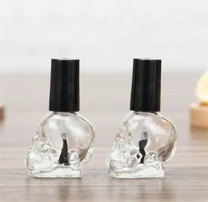 IBELONG Clear 10ml Skull Glass Nail Polish Empty Bottle Packaging with Brush Supplier